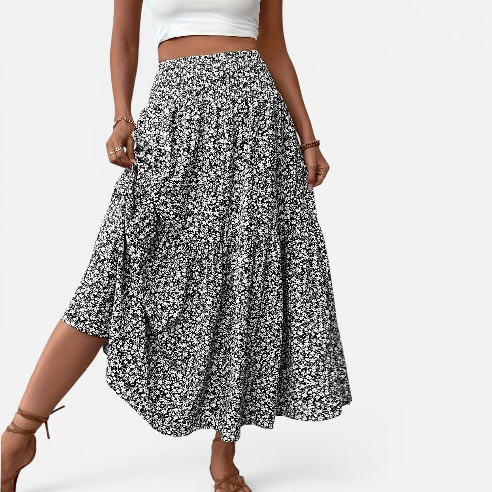 Falda larga de cintura alta con estampado floral y volantes